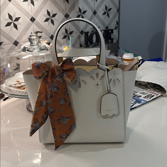 K S Magnolia Eyelet Mini Satchel/Crossbody Does not include handmade jewelry.